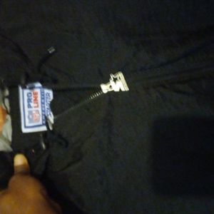Steelers starters jacket large size it is an black jacket with the hood